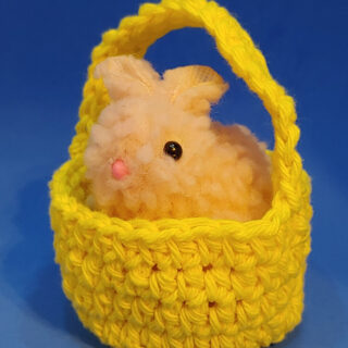Cute Bunny in a Yellow Hand-Crocheted Basket