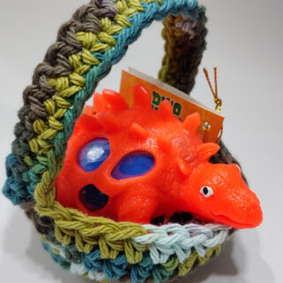 Stretchy Orange Dino in Hand-Crocheted Camo Basket